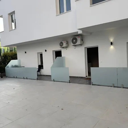 White Arena Apartments Golem *
