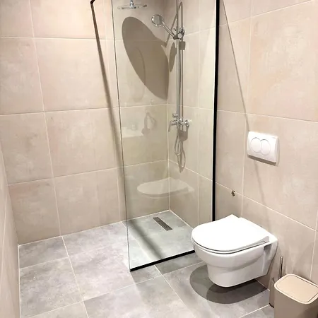 White Arena Apartments Golem *