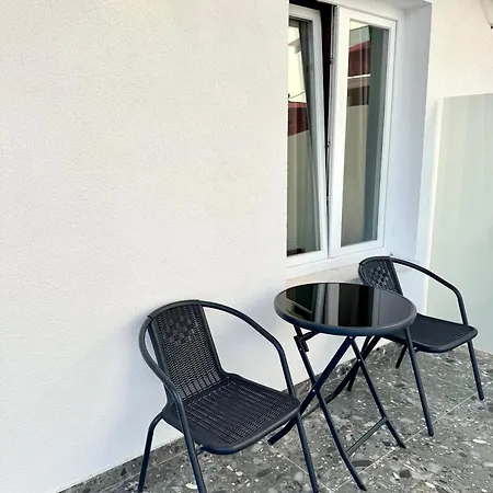 White Arena Apartments Golem *
